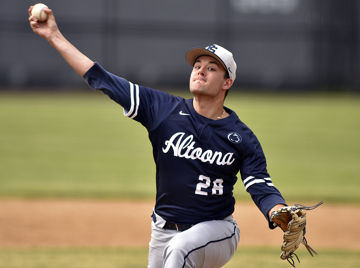 Photo (by Kevin Gilbert): Sophomore pitcher Tyler Manger throws during Wednesday's ECAC Tournament game against Wilson at Henninger Field.