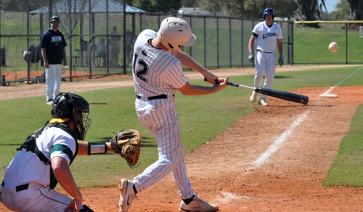 Lions Get First Conference Win in Split at La Roche