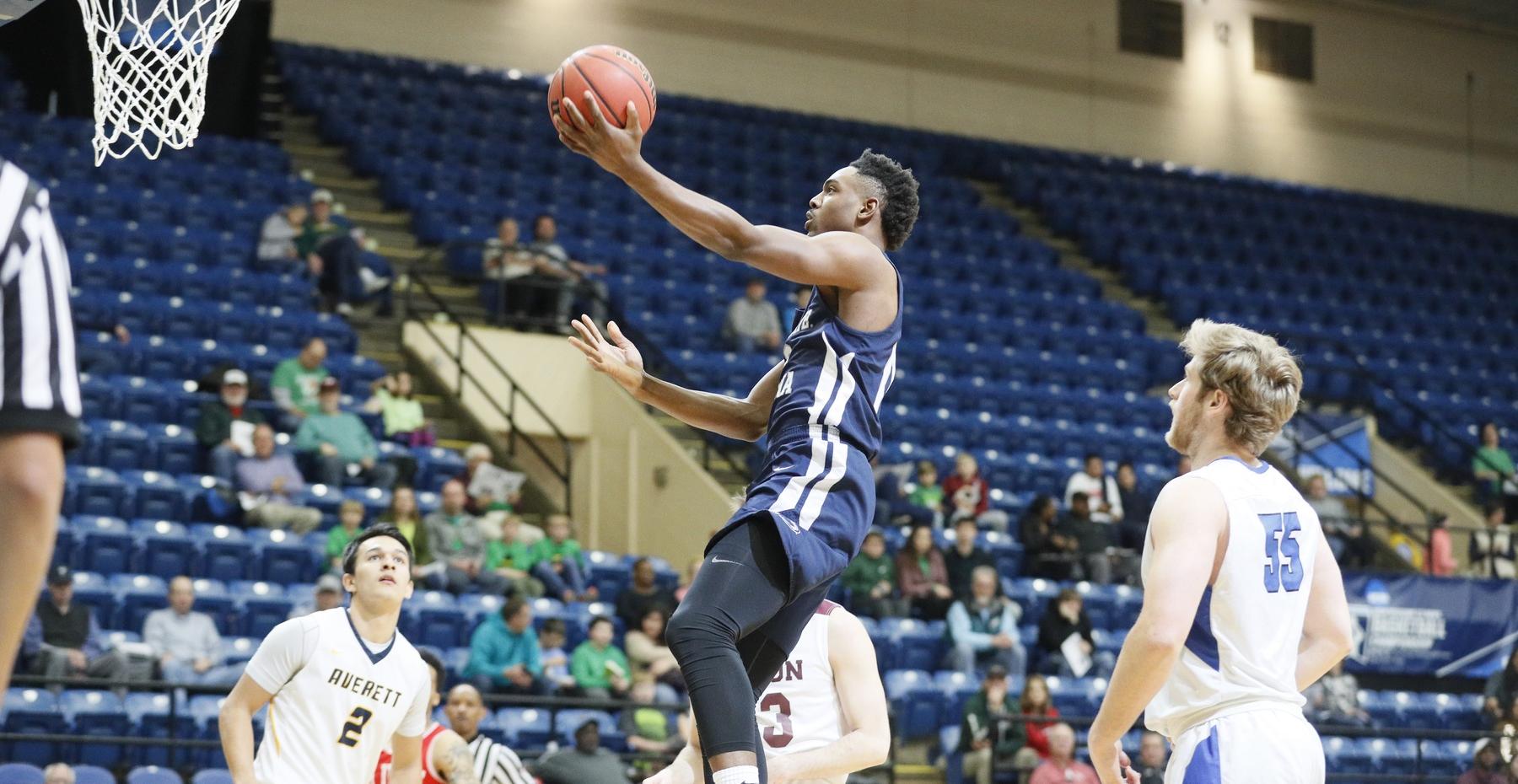 Photo (by Keith Lucas): Penn State Altoona senior Ishimeal Nance drives in for a layup during Saturday's Division III College All-Star Game in the Salem Civic Center.
