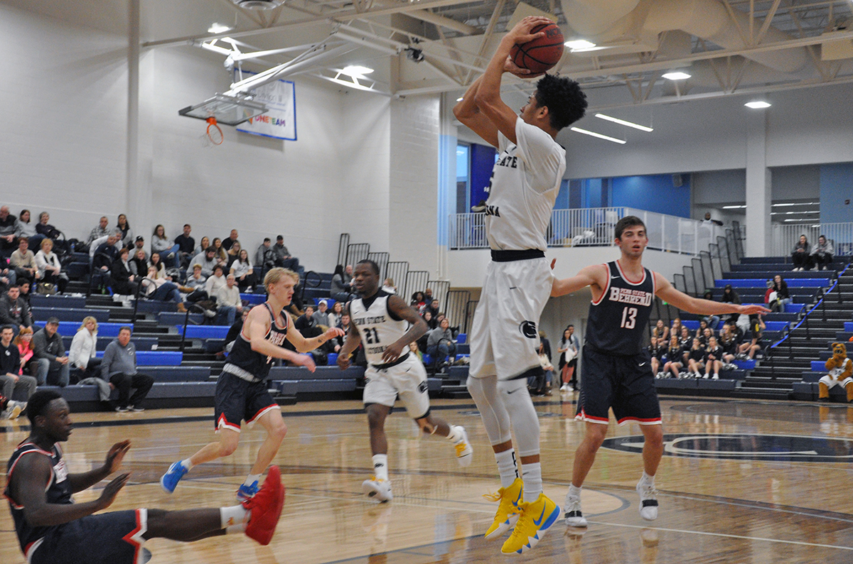 Photo (by Tim Belardi): Penn State Altoona's Tyson West takes a jump shot during Saturday's loss to Penn State Behrend in the Adler Arena.
