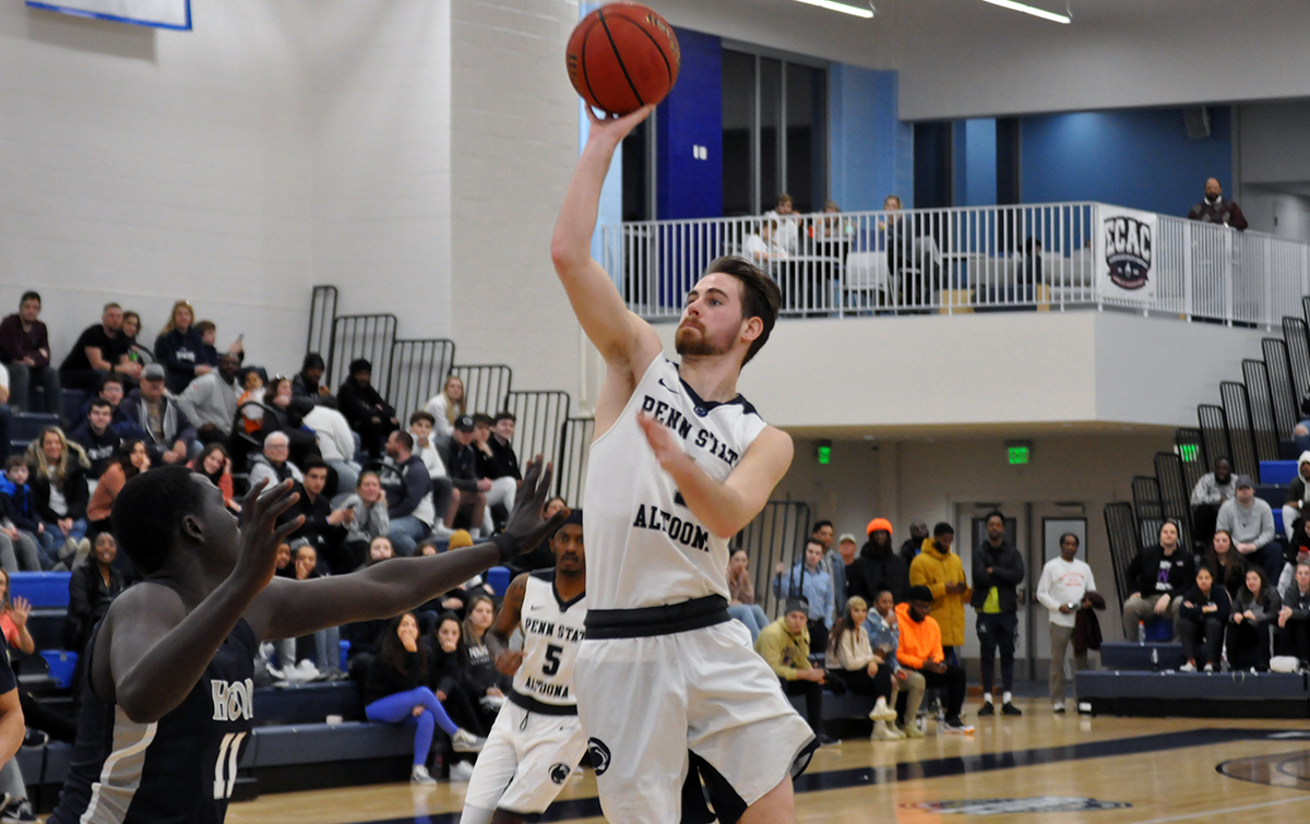 Photo (by Oliver Dailey): Sophomore guard Jack Kusters puts up a shot during Wednesday night's ECAC Tournament game against Hood in the Adler Arena.