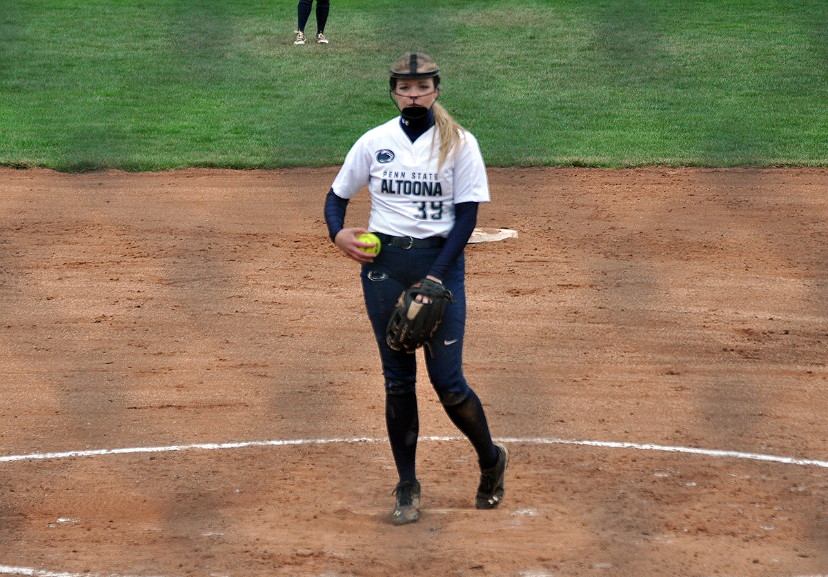 Photo (by Joel Nelson): Sophomore pitcher Sidney Shultz gets her sign in the circle during game two on Wednesday against Franciscan at Stewart Athletic Field.