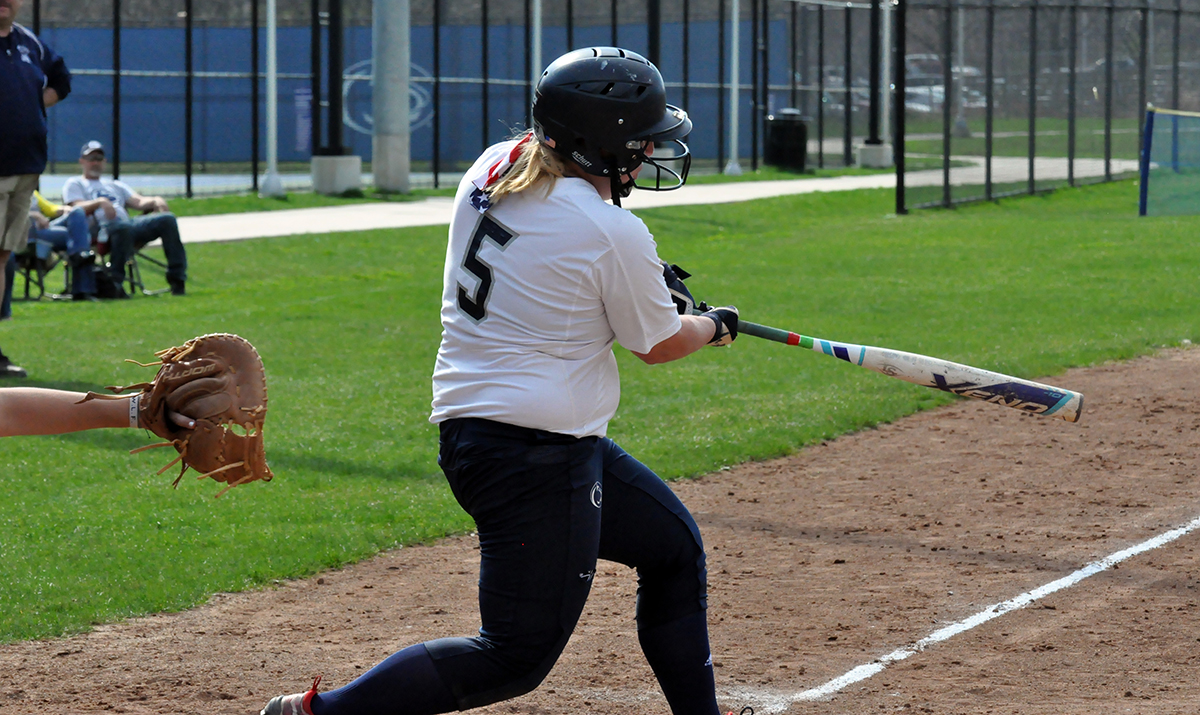 Photo (by Cory Maines): Junior third baseman Abby Showers takes a cut during Thursday's doubleheader at home against Juniata College.