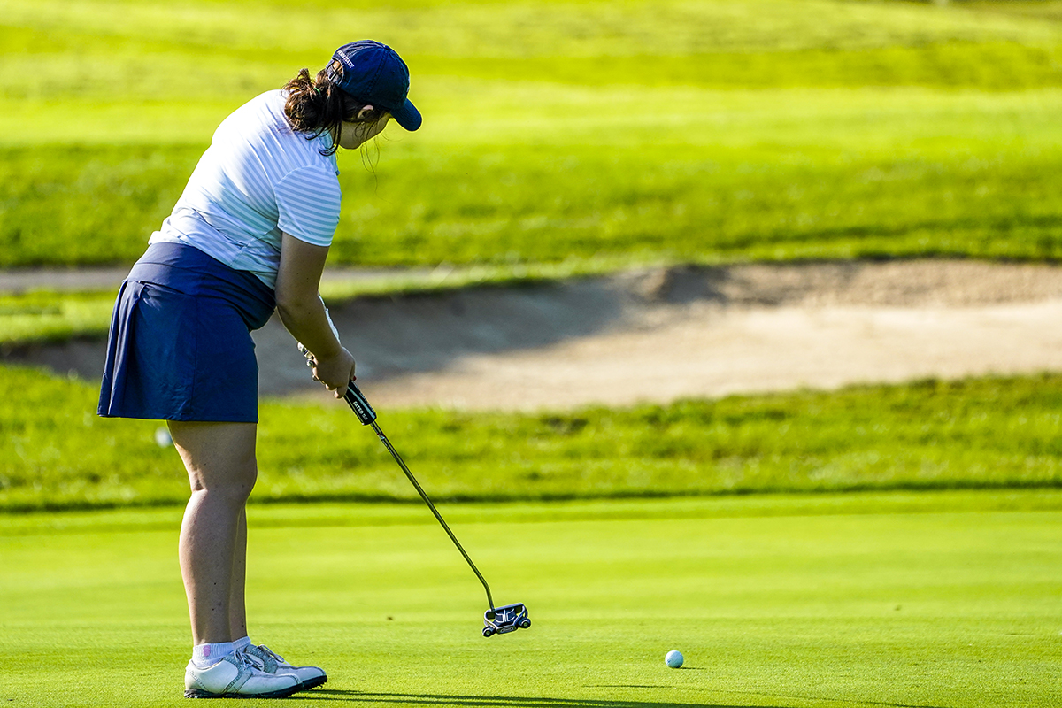 Photo (by Chuck Meyers): Freshman Katie Pupillo putts during Saturday's Penn State Altoona Invitational at Sinking Valley Country Club.
