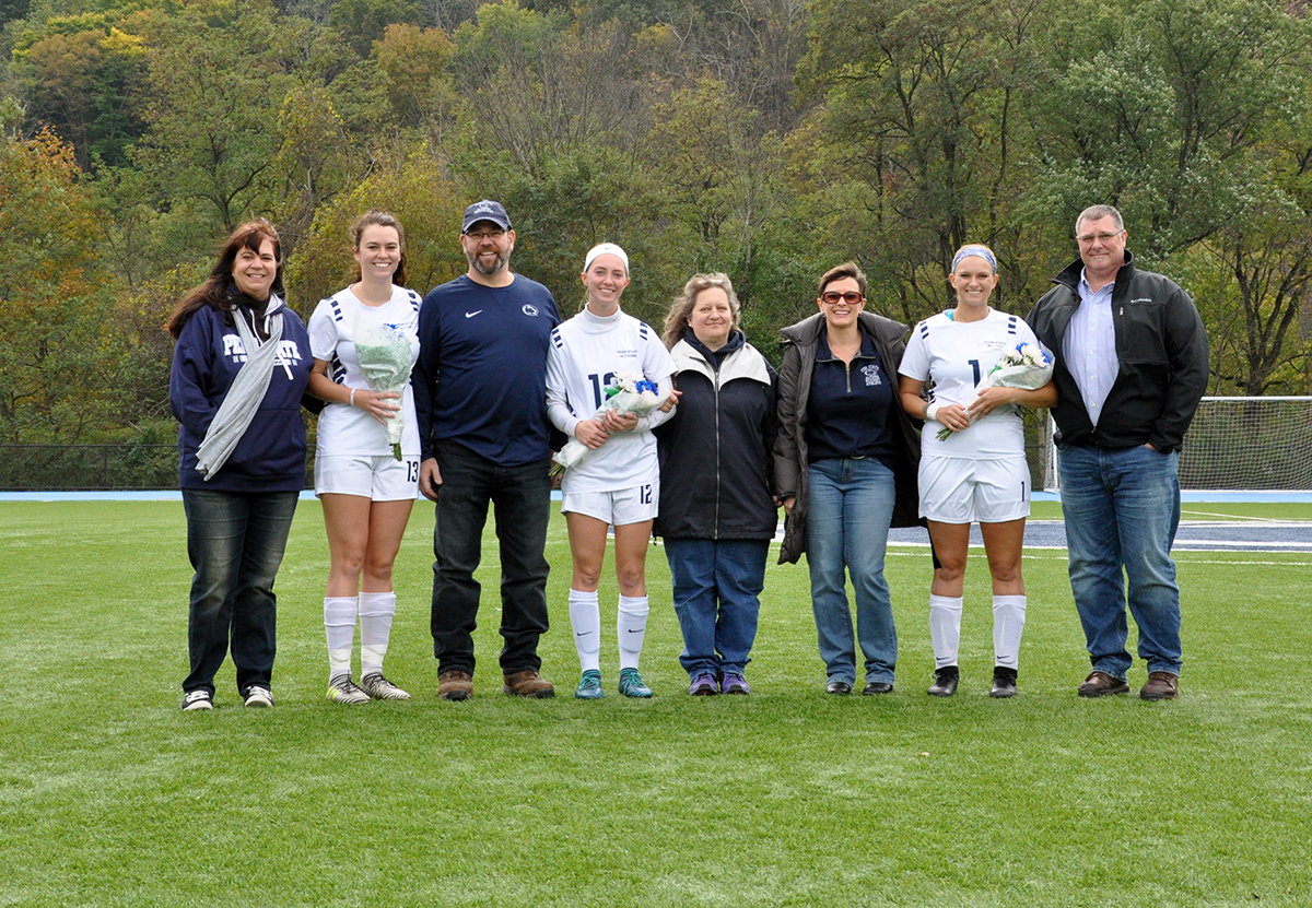 Photo: Women's soccer recognized its seniors (#13 Kyrstin Johnson, #12 Haley Giedroc, and #1 Sydney Emershaw) as part of its Senior Day ceremony on Saturday.
