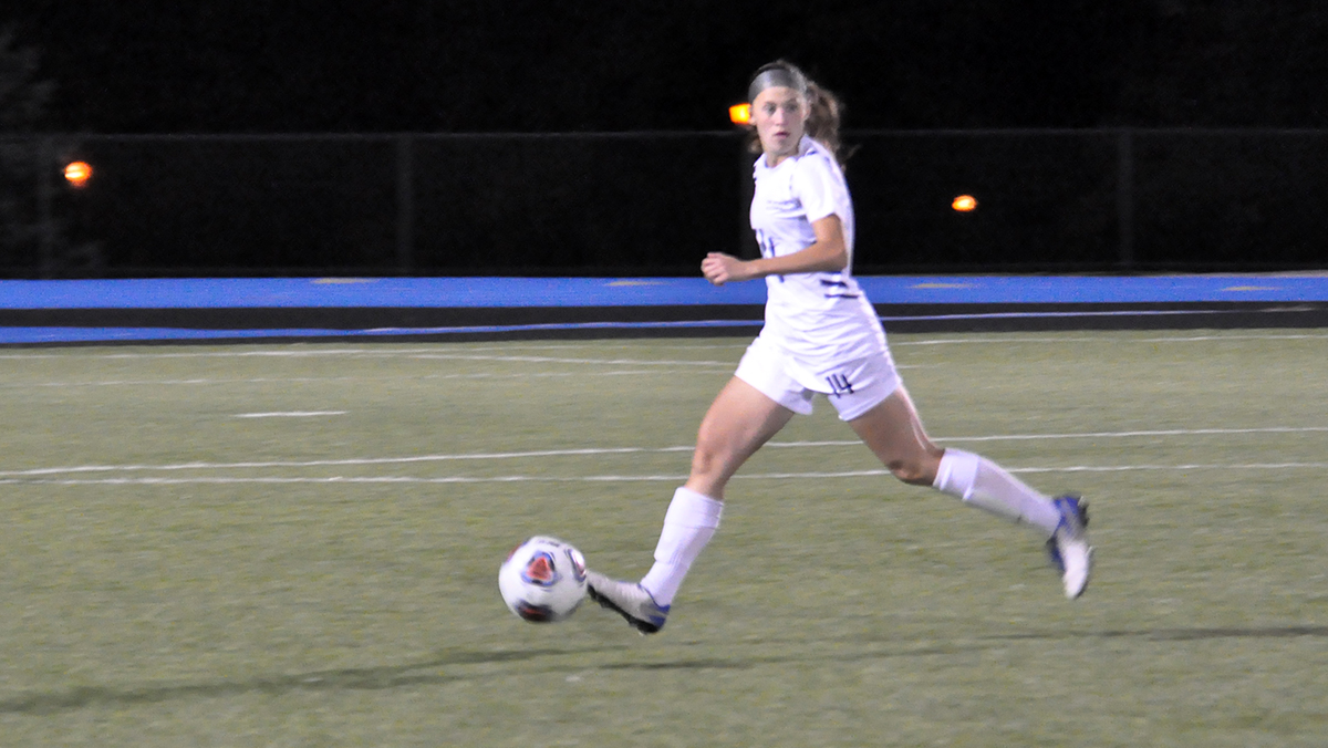 Photo (by Omer Sanchez): Sophomore defender Alana Masullo looks downfield during Wednesday night's game against Pitt-Greensburg.