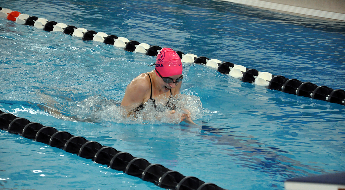 Photo: Freshman Avery Heisey swims the 100 Yard Breaststroke during Friday night's meet against Gallaudet.